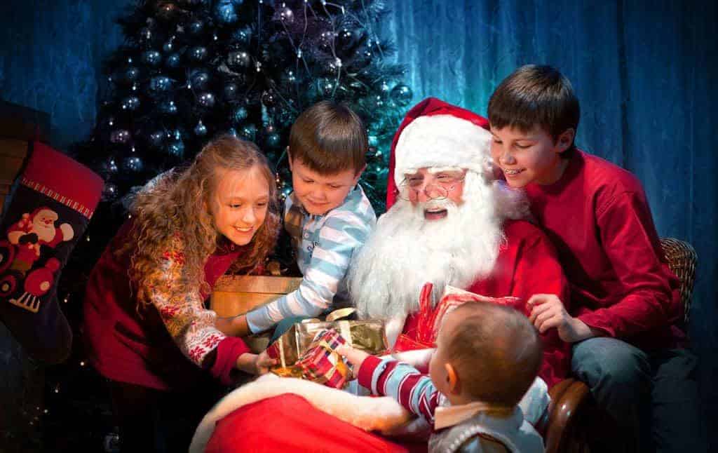 Santa with kids at house party. Book Santa for house party.