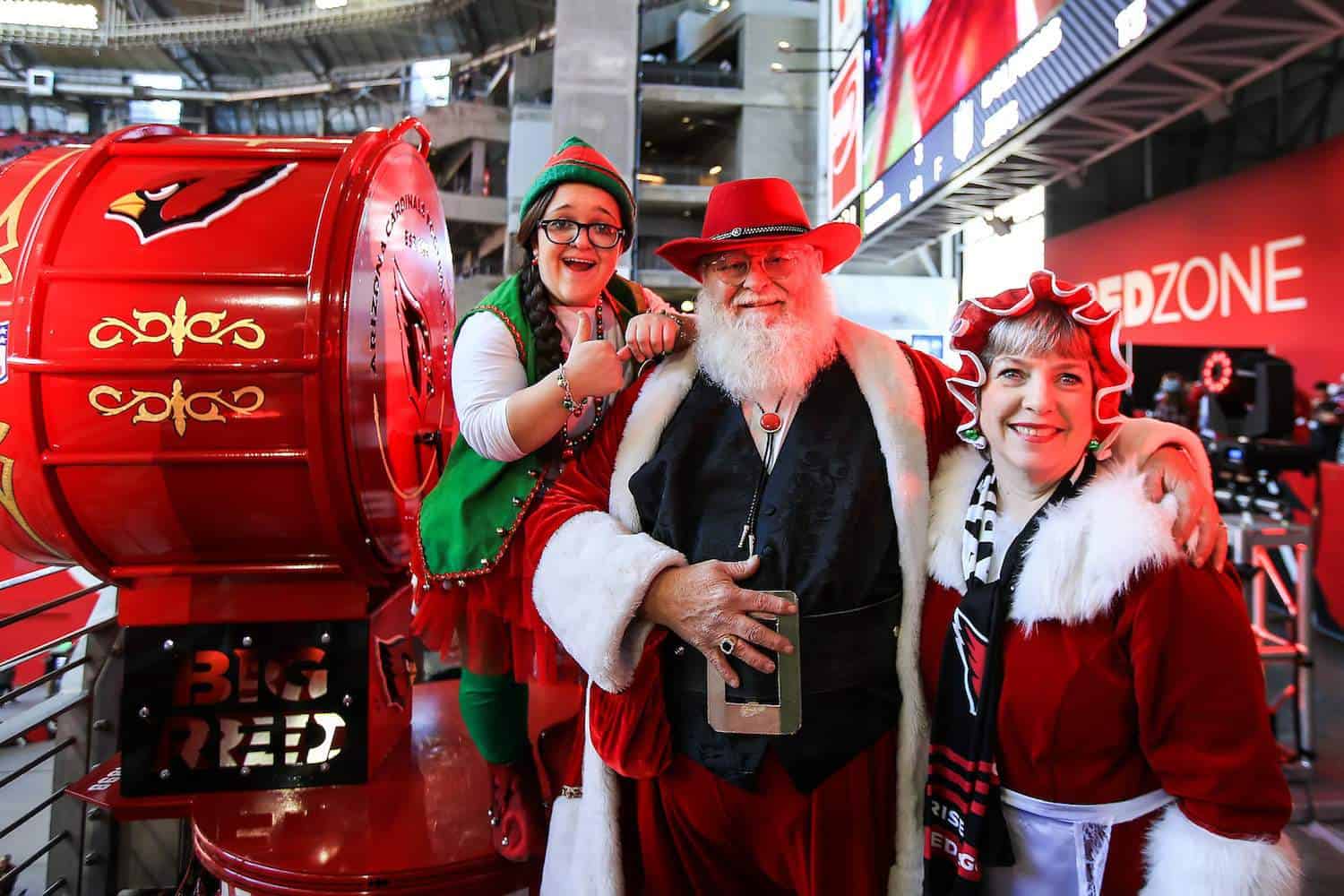 Santa and Mrs. Claus with Elf