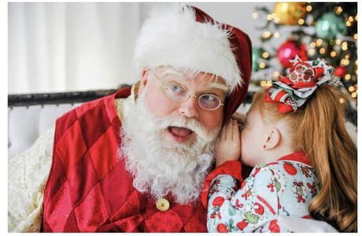 Professional Santa Claus in Hartford Connecticut sharing a warm holiday moment with a child