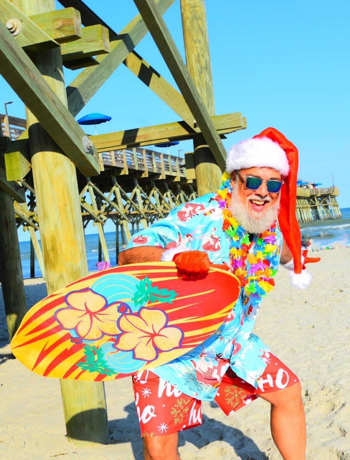 Professional Santa Claus in Jacksonville Florida at a coastal holiday appearance near the beach