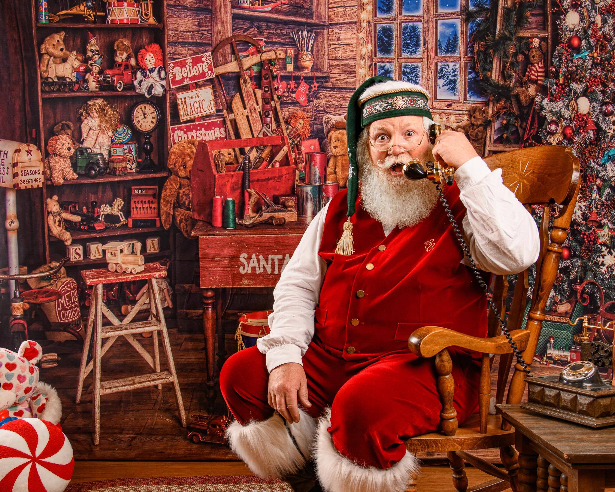 Professional Santa Claus in Sacramento California seated in an elegant holiday photo setup