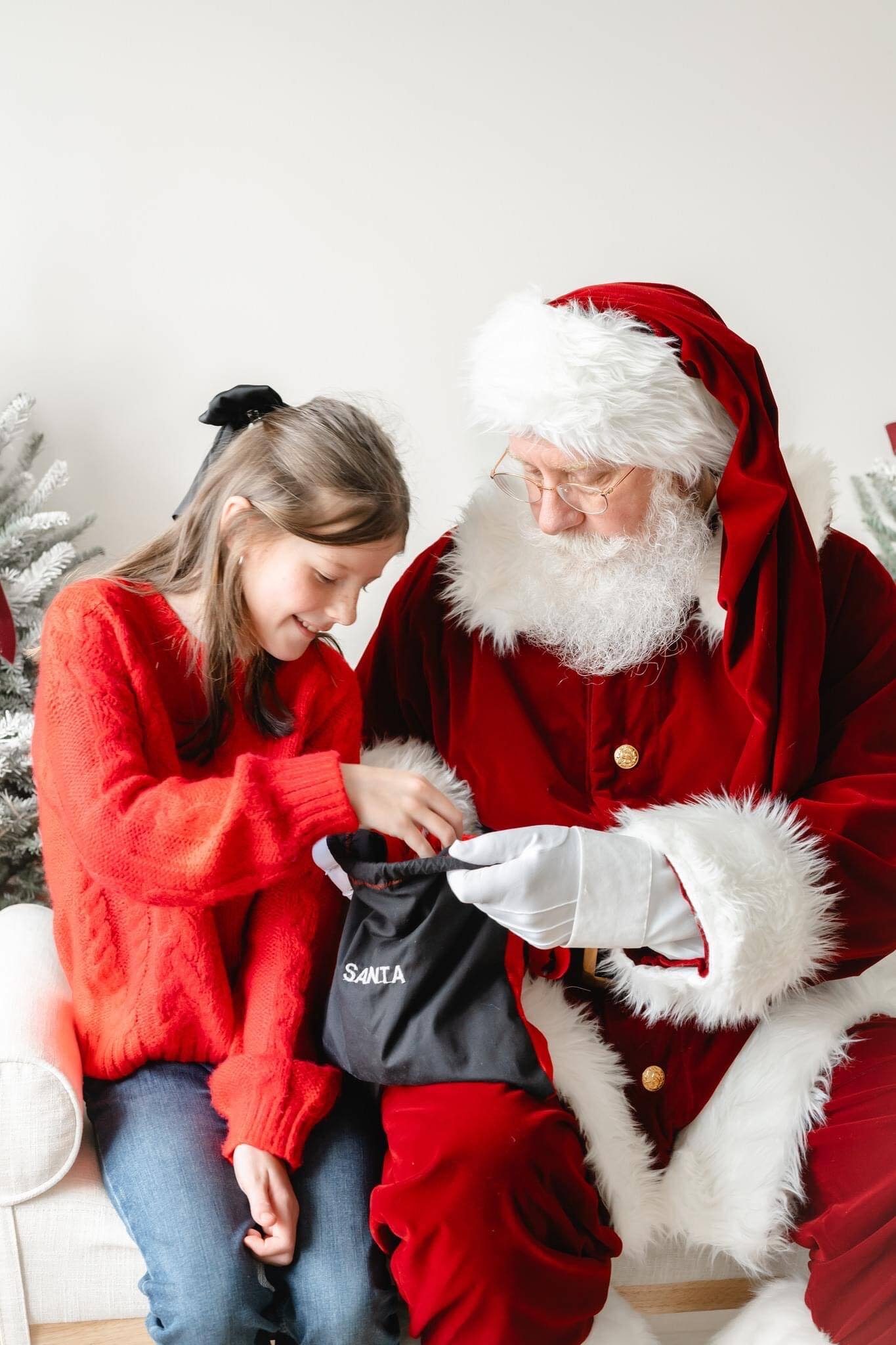 Professional Santa Claus in Cleveland Ohio greeting a child during a holiday event